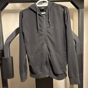 Black Oakley Zip Up. Very comfortable. Great condition!